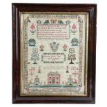 AN EARLY VICTORIAN NEEDLEWORK SAMPLER BY ELIZABETH SHELDON worked with brightly coloured silks on