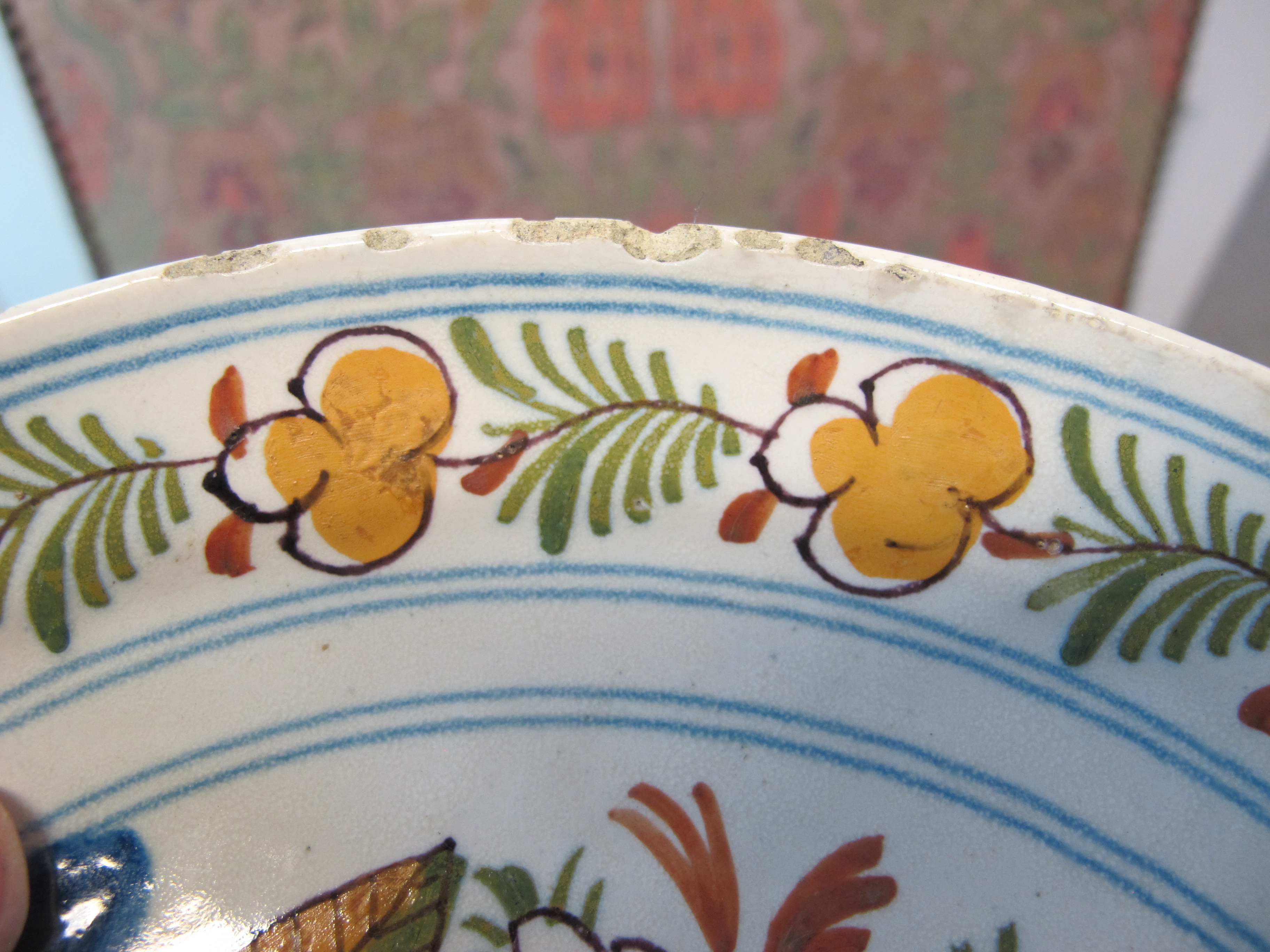 THREE DELFTWARE POTTERY PLATES 18TH CENTURY polychrome decorated with a bird on a fence, and urns of - Image 11 of 24