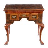 A RARE GEORGE II YEW AND WALNUT LOWBOY C.1730 inlaid with stringing, the burr veneered top inlaid