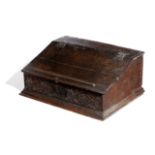 AN OAK DESK BOX POSSIBLY WEST COUNTRY, MID-17TH CENTURY the hinged fall with an integral rest,