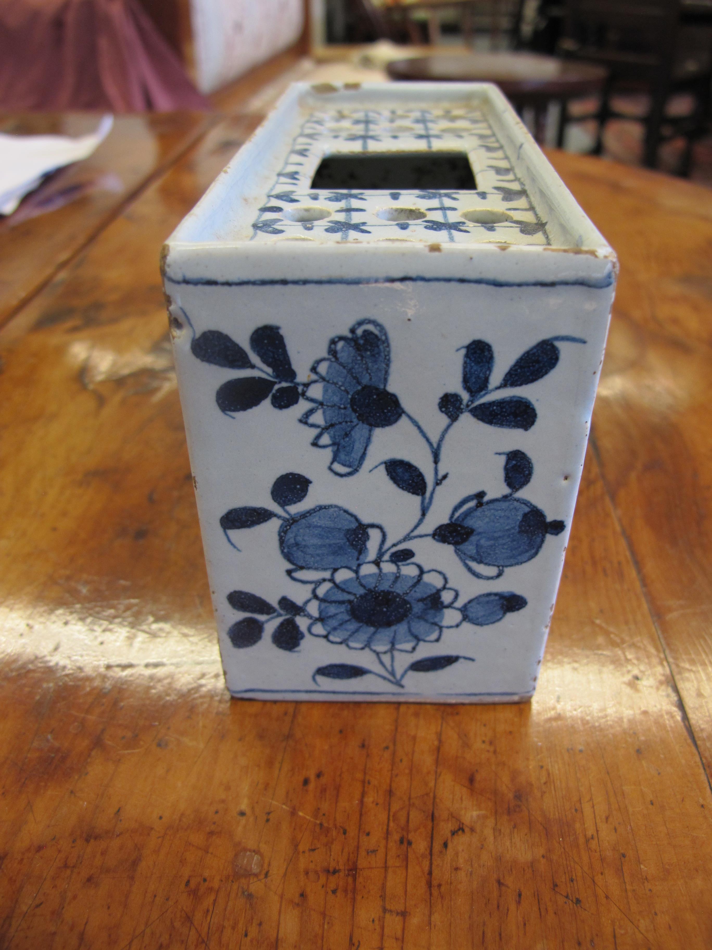 A DELFTWARE POTTERY BLUE AND WHITE FLOWER BRICK C.1740-60 painted with flowers in Chinese style, the - Image 5 of 10