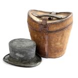 A CANVAS AND LEATHER HAT BOX LATE 19TH / EARLY 20TH CENTURY of bucket shape, the lid with