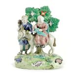 A WALTON PEARLWARE POTTERY GROUP 'FLIGHT TO EGYPT' C.1820 modelled with the Holy family, Joseph