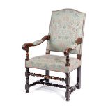 A FRENCH WALNUT HIGHBACK OPEN ARMCHAIR LATE 17TH / EARLY 18TH CENTURY with a padded back and seat