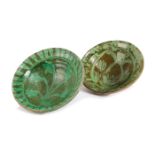 TWO SPANISH POTTERY BOWLS 19TH / 20TH CENTURY each decorated with green leaves (2) 31.5cm
