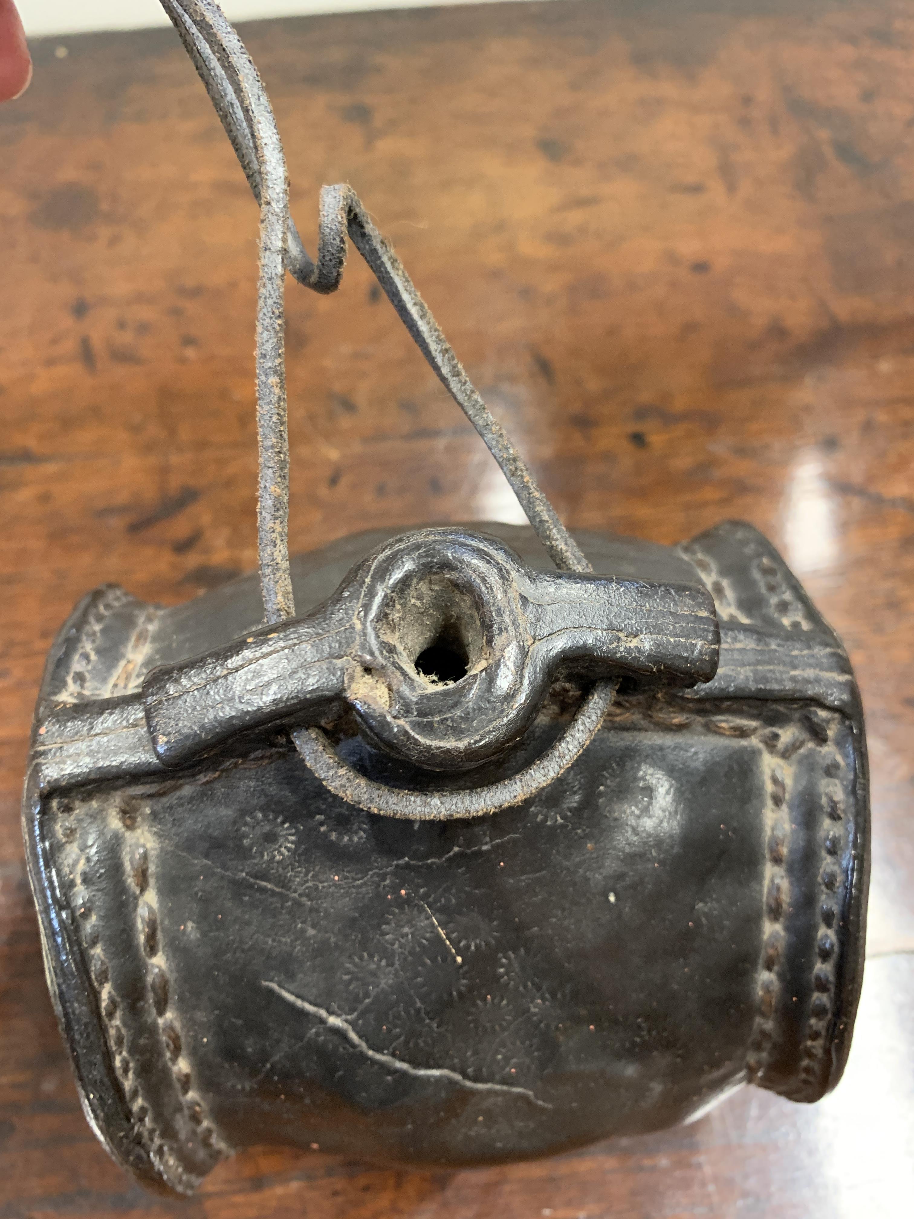 A LEATHER COSTREL LATE 17TH / EARLY 18TH CENTURY of shouldered form, with an open spout, pierced - Image 6 of 7