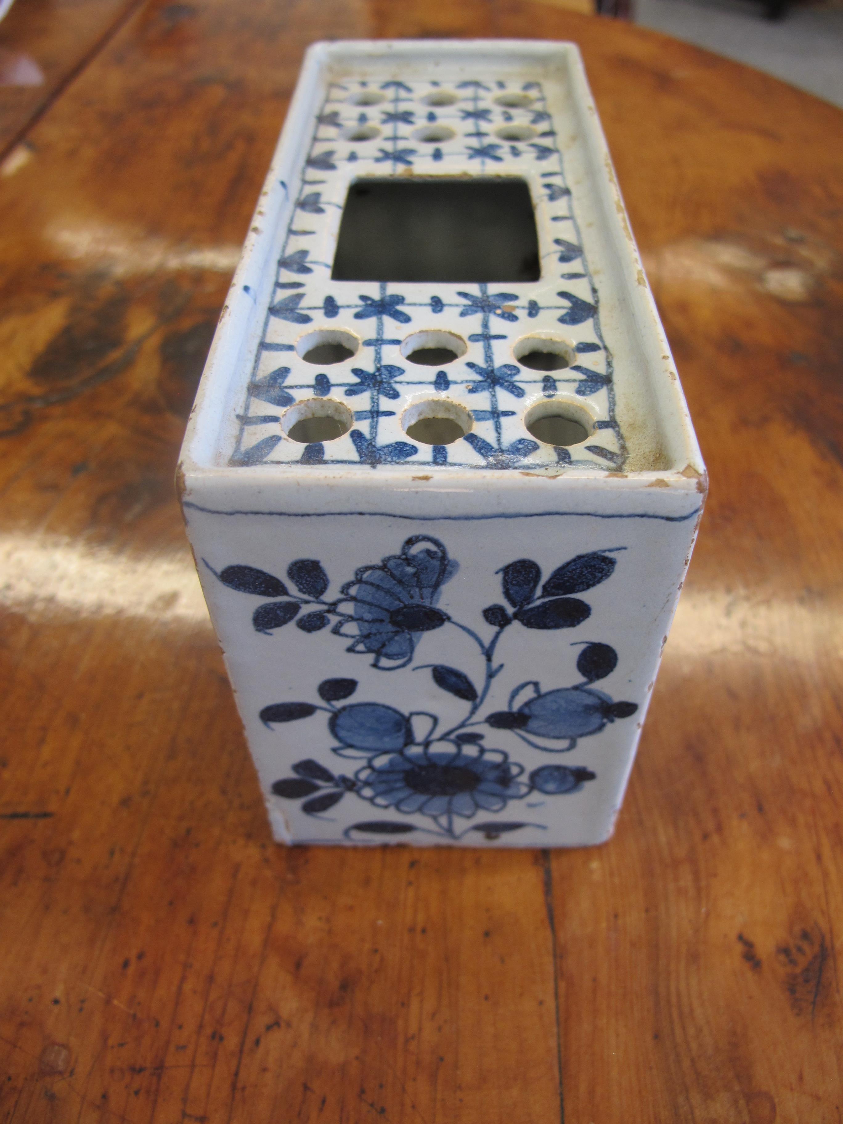 A DELFTWARE POTTERY BLUE AND WHITE FLOWER BRICK C.1740-60 painted with flowers in Chinese style, the - Image 3 of 10