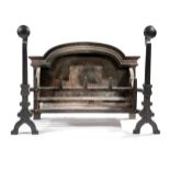 A CAST IRON FIREGRATE IN 17TH CENTURY STYLE LATE 19TH / EARLY 20TH CENTURY with an arched back and a