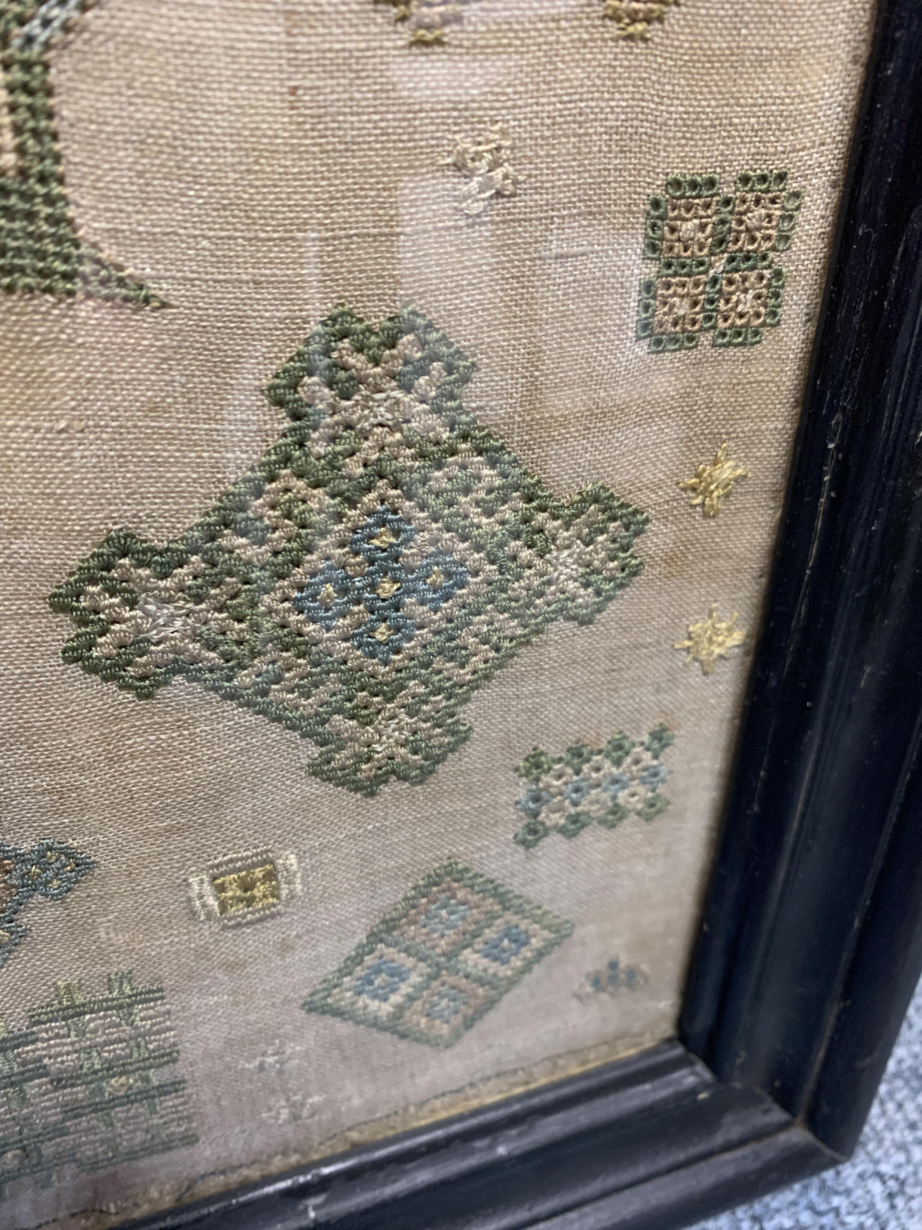 A RARE NEEDLEWORK SPOT SAMPLER BY GRACE THRUSTON, MID-17TH CENTURY worked with polychrome silks on - Image 11 of 15