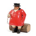 A CARVED AND PAINTED WOOD FIGURE OF A HUNTSMAN IN THE MANNER OF FRANK WHITTINGTON OF FOREST TOYS,