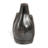 A WILLIAM AND MARY LEATHER FLASK LATE 17TH CENTURY of shouldered bottle form, with an open spout,