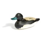 AN AMERICAN PAINTED PINE DECOY DUCK BY MASON DECOY COMPANY, DETROIT, MICHIGAN, C.1904-1923 in the