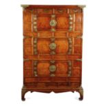 A KOREAN ELM AND BURR ELM CABINET 19TH CENTURY with brass mounts and handles, with four frieze