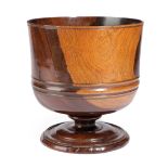 A CHARLES II LIGNUM VITAE WASSAIL BOWL C.1670 with an incised moulding to rim and a moulded band