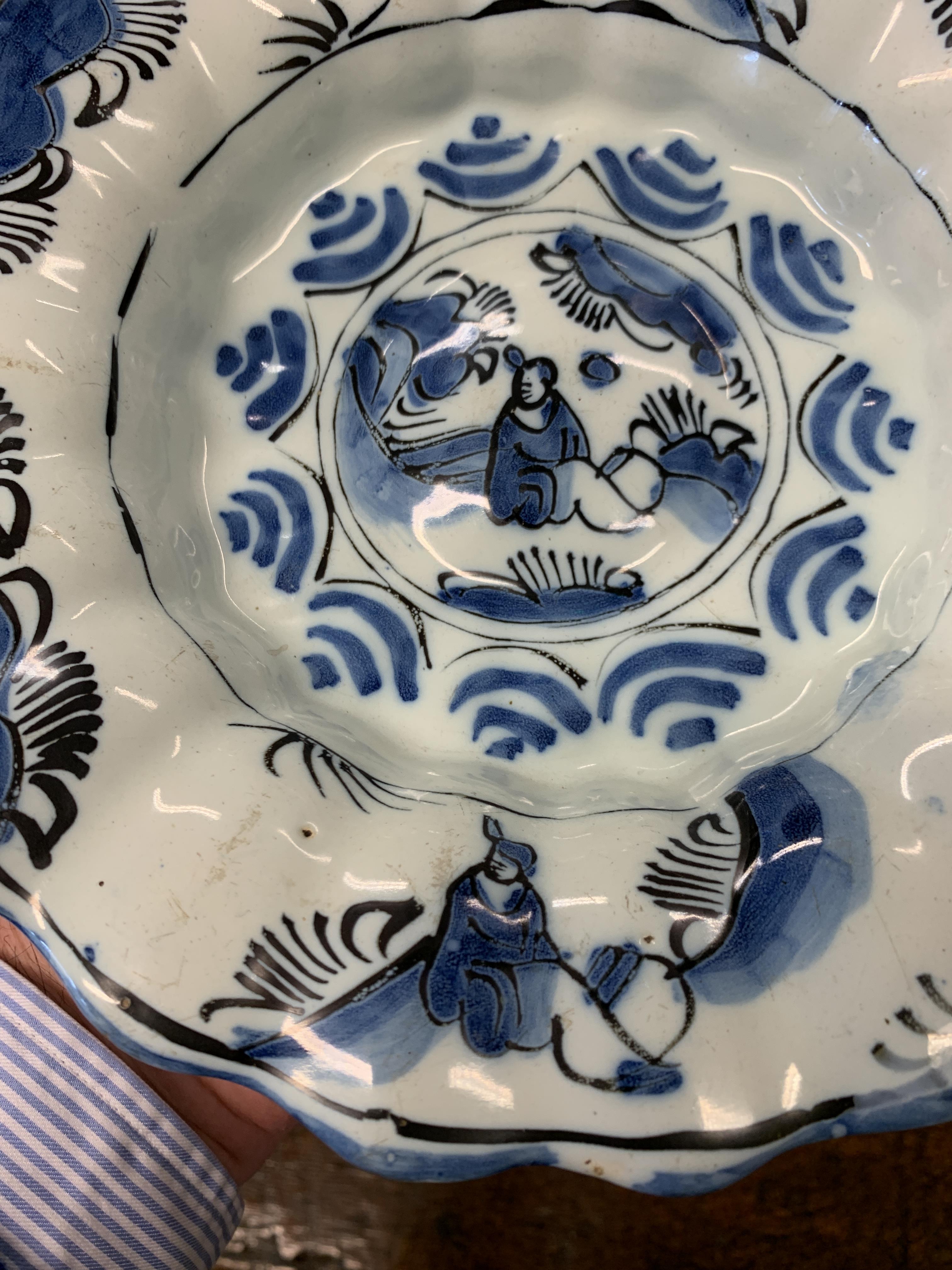 TWO DELFT POTTERY LOBED DISHES EARLY 18TH CENTURY each painted in blue and black with a seated - Image 6 of 16