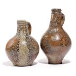 TWO SMALL BROWN STONEWARE BELLARMINE JUGS GERMAN, 17TH CENTURY both with a mottled tiger-ware type