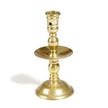 A DUTCH BRASS HEEMSKERK CANDLESTICK SECOND HALF 17TH CENTURY with a pierced socket and a turned