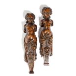 A NEAR PAIR OF CARVED WALNUT TERMS FRENCH OR ITALIAN, LATE 16TH / EARLY 17TH CENTURY each in the