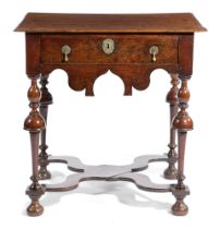 A WILLIAM AND MARY OAK SIDE TABLE C.1690 the rectangular top with a moulded edge, above a frieze
