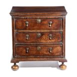 A WILLIAM AND MARY OAK CHEST LATE 17TH / EARLY 18TH CENTURY with three elm lined long drawers, on