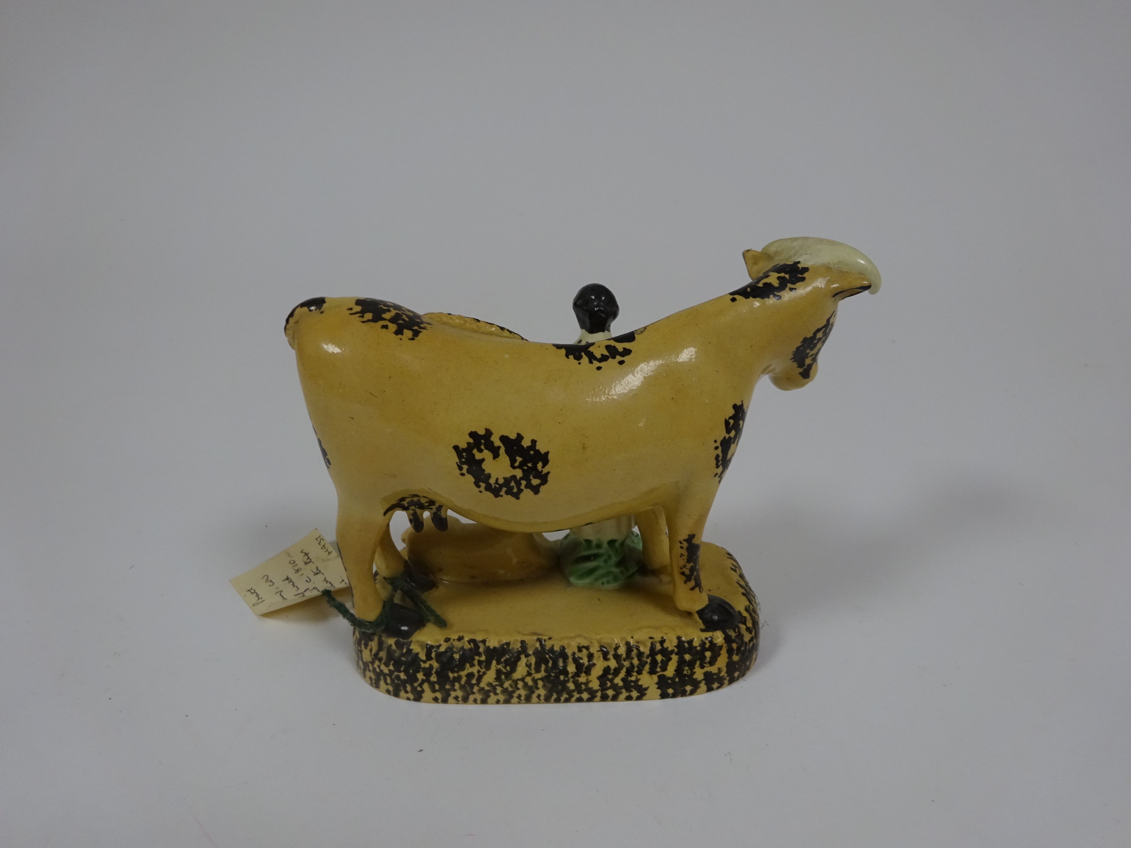 A YORKSHIRE PRATT TYPE POTTERY COW GROUP C.1810 the buff coloured bovine with sponge decoration - Image 4 of 6