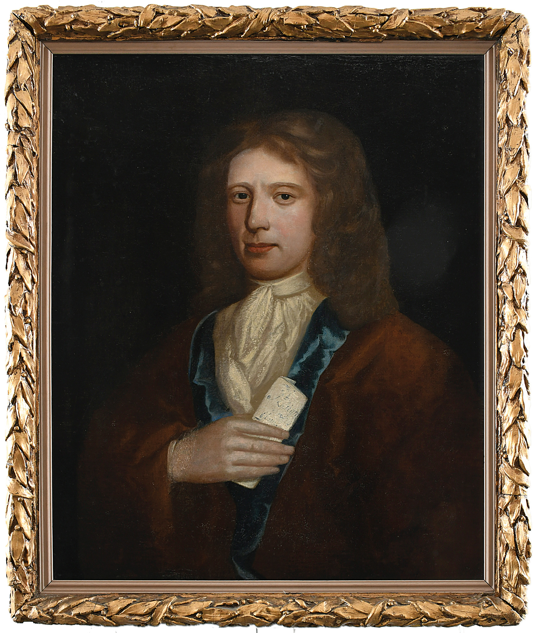 ENGLISH SCHOOL EARLY 18TH CENTURY Portrait of a gentleman, half-length, wearing a brown coat with