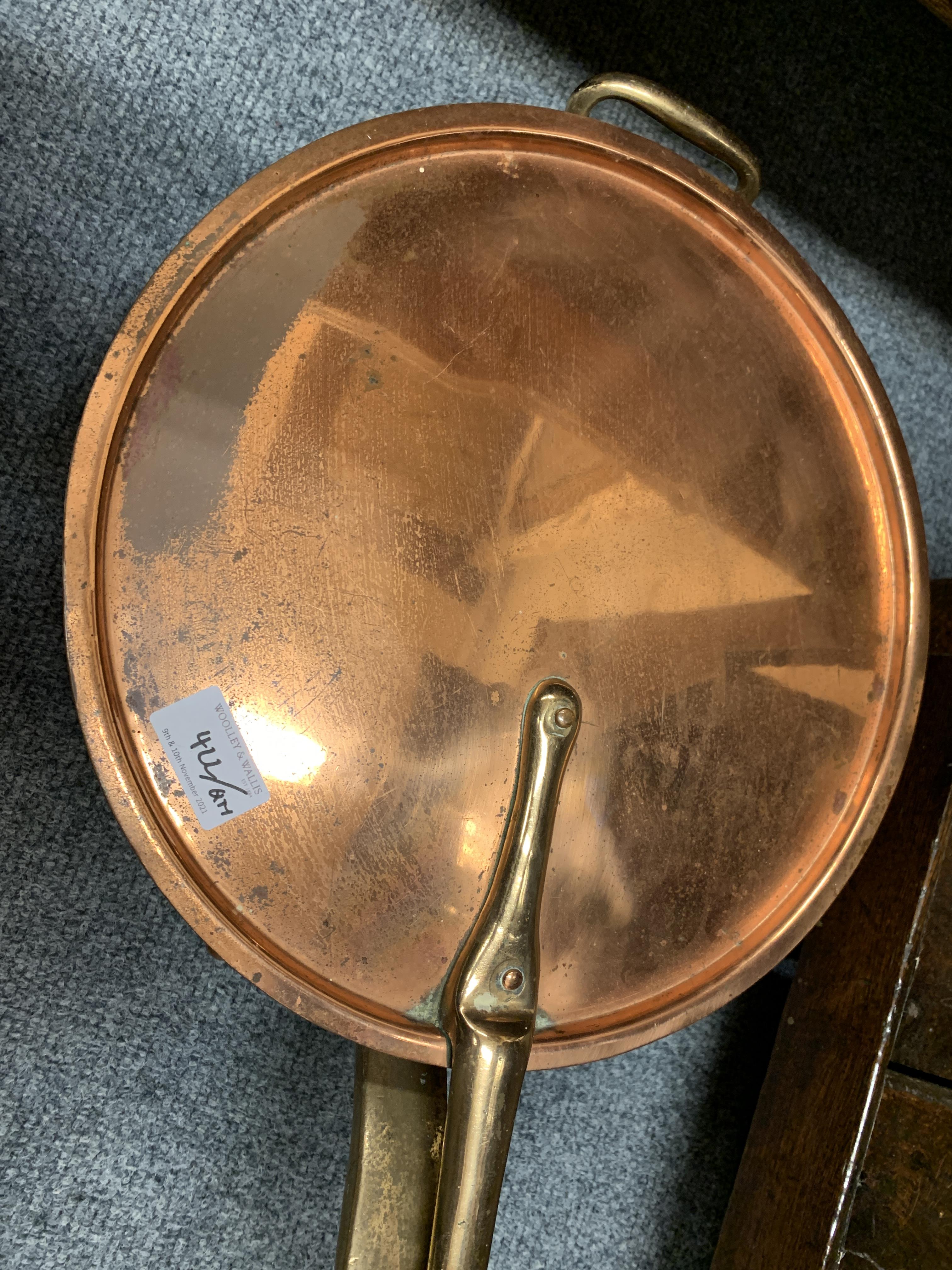 A COLLECTION OF COPPER AND BRASS WARE EARLY 19TH CENTURY AND LATER including: a copper skillet and a - Image 3 of 14