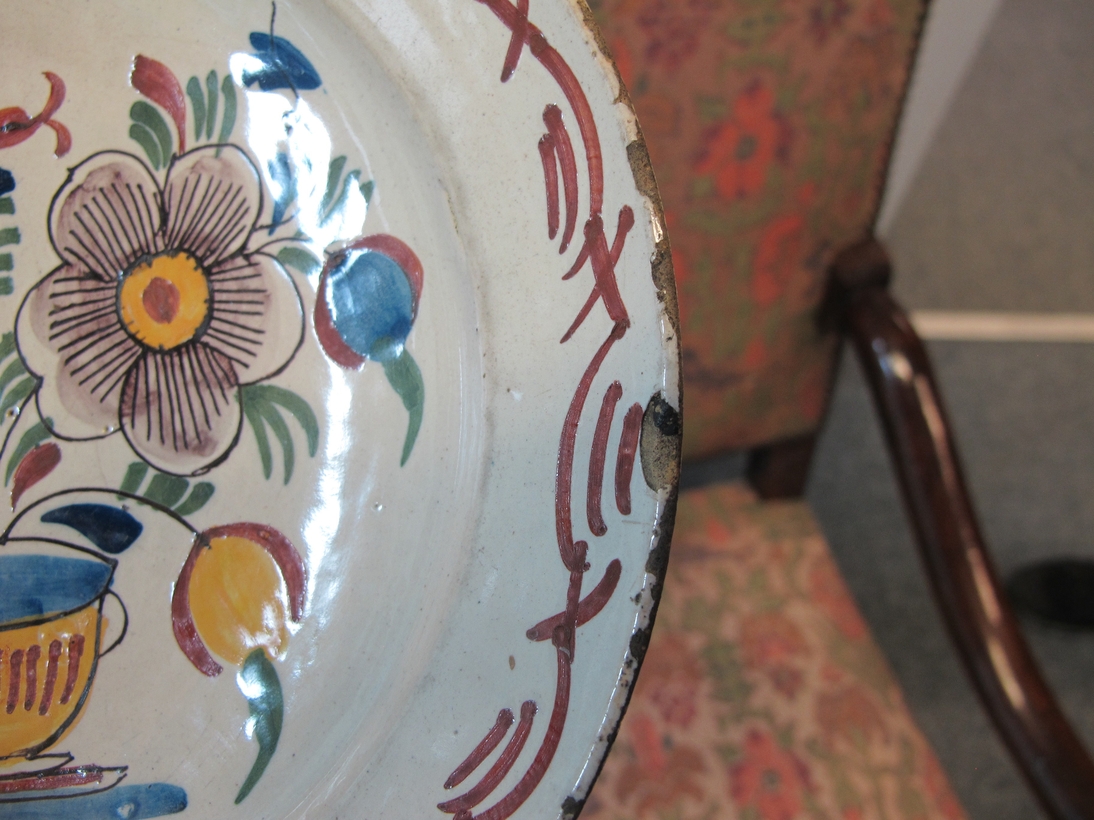 THREE DELFTWARE POTTERY PLATES 18TH CENTURY polychrome decorated with a bird on a fence, and urns of - Image 4 of 24