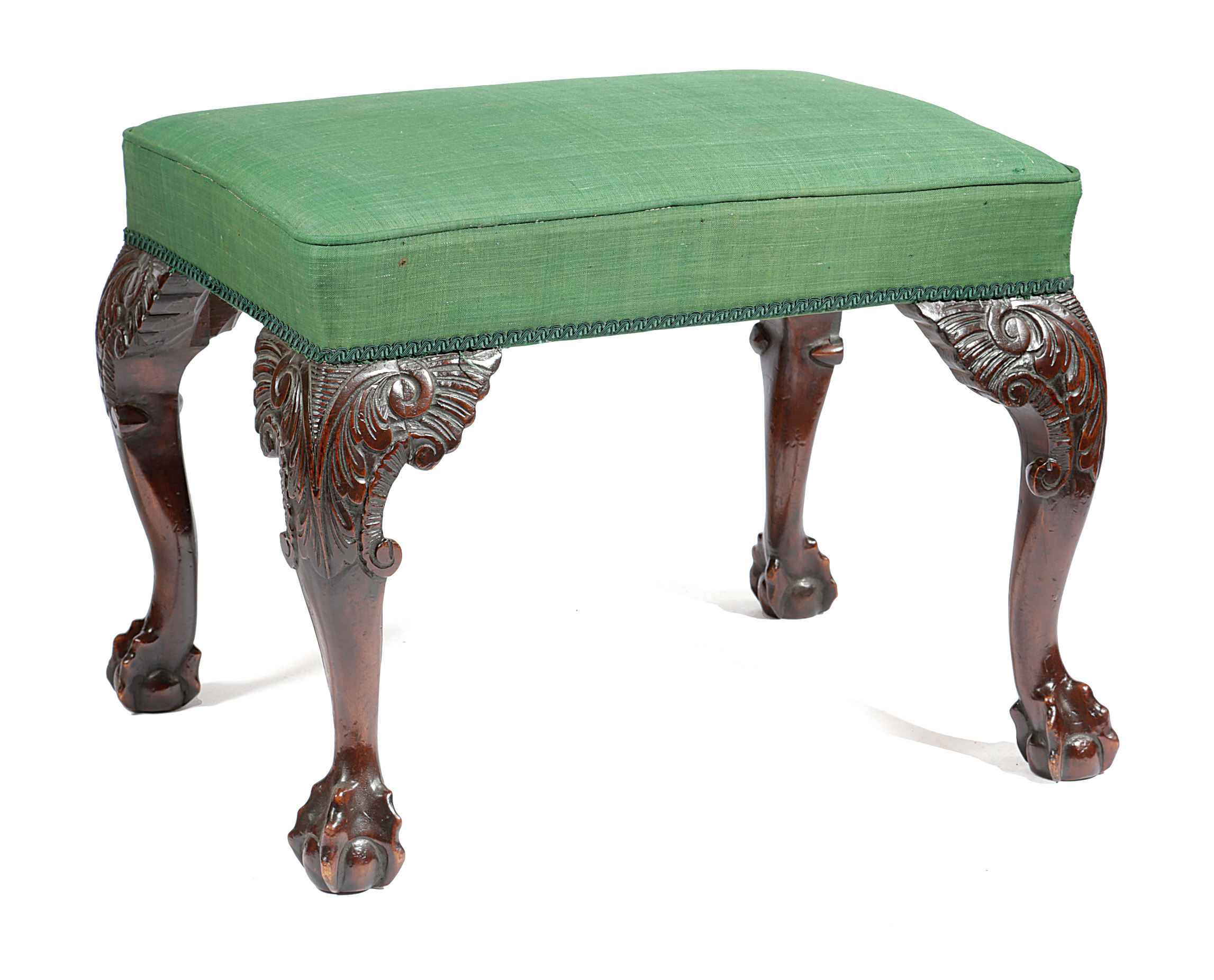 A GEORGE II IRISH WALNUT STOOL C.1740 the padded seat covered with green fabric, on cabriole legs