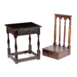 AN OAK PRIE DIEU 19TH CENTURY with turned supports, the base with a part hinged top revealinbg a