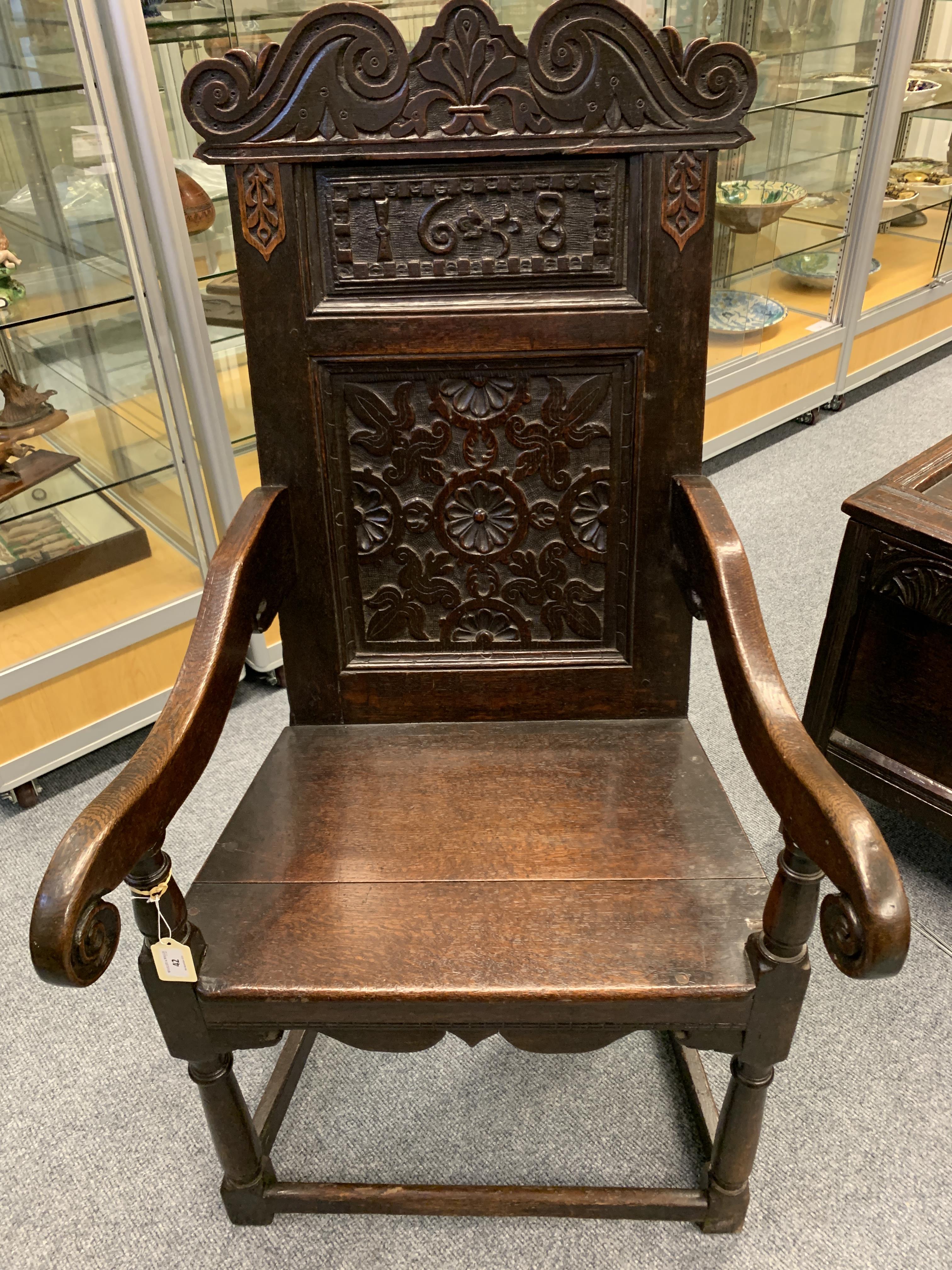 A CHARLES I OAK PANELLED BACK ARMCHAIR DATED '1638' the scroll carved crest centred with a fleur- - Image 13 of 13