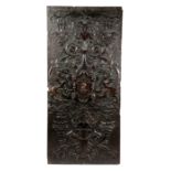 A LARGE PAIR OF CARVED OAK PANELS EARLY 17TH CENTURY each relief decorated, one with a the bust of