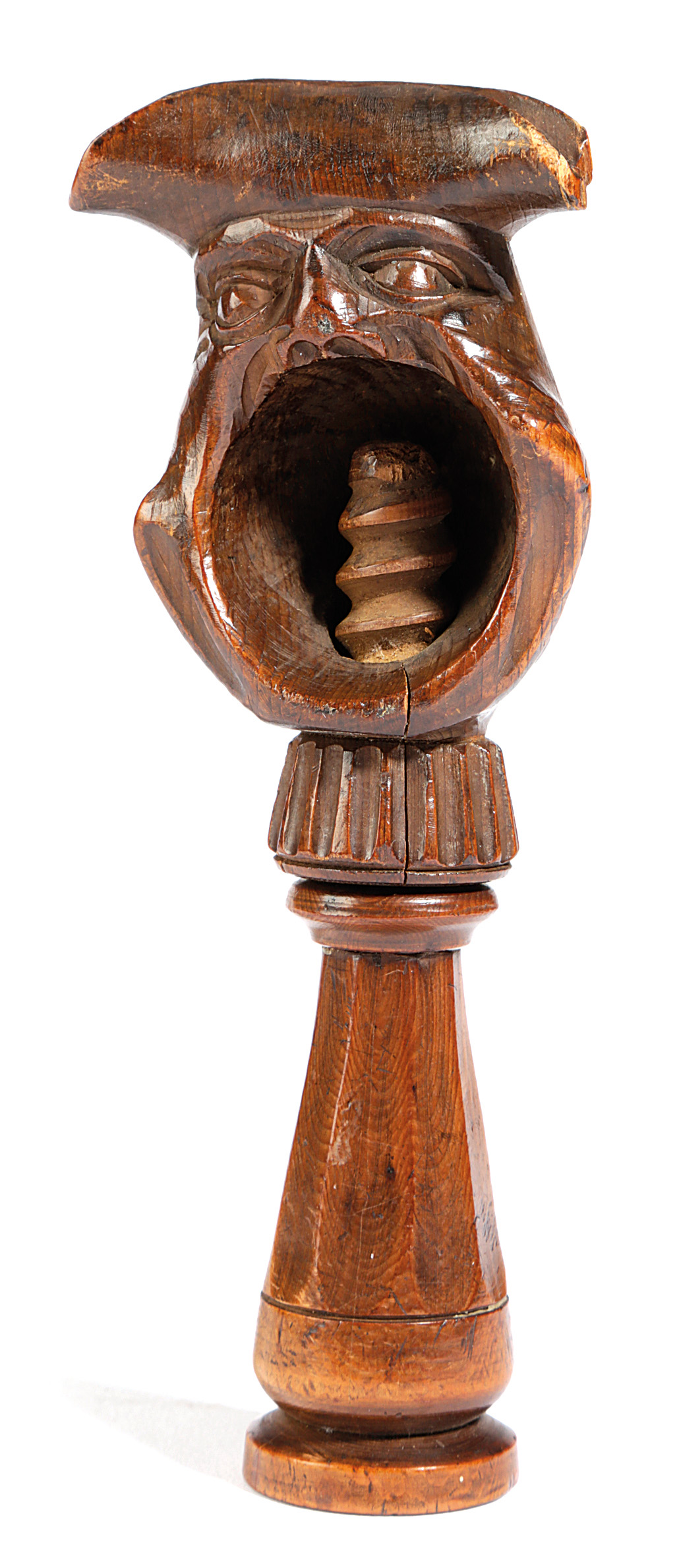 A SWISS TREEN NOVELTY NUTCRACKER 19TH CENTURY carved as a bust of a man wearing a tricorn hat, the