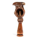 A SWISS TREEN NOVELTY NUTCRACKER 19TH CENTURY carved as a bust of a man wearing a tricorn hat, the