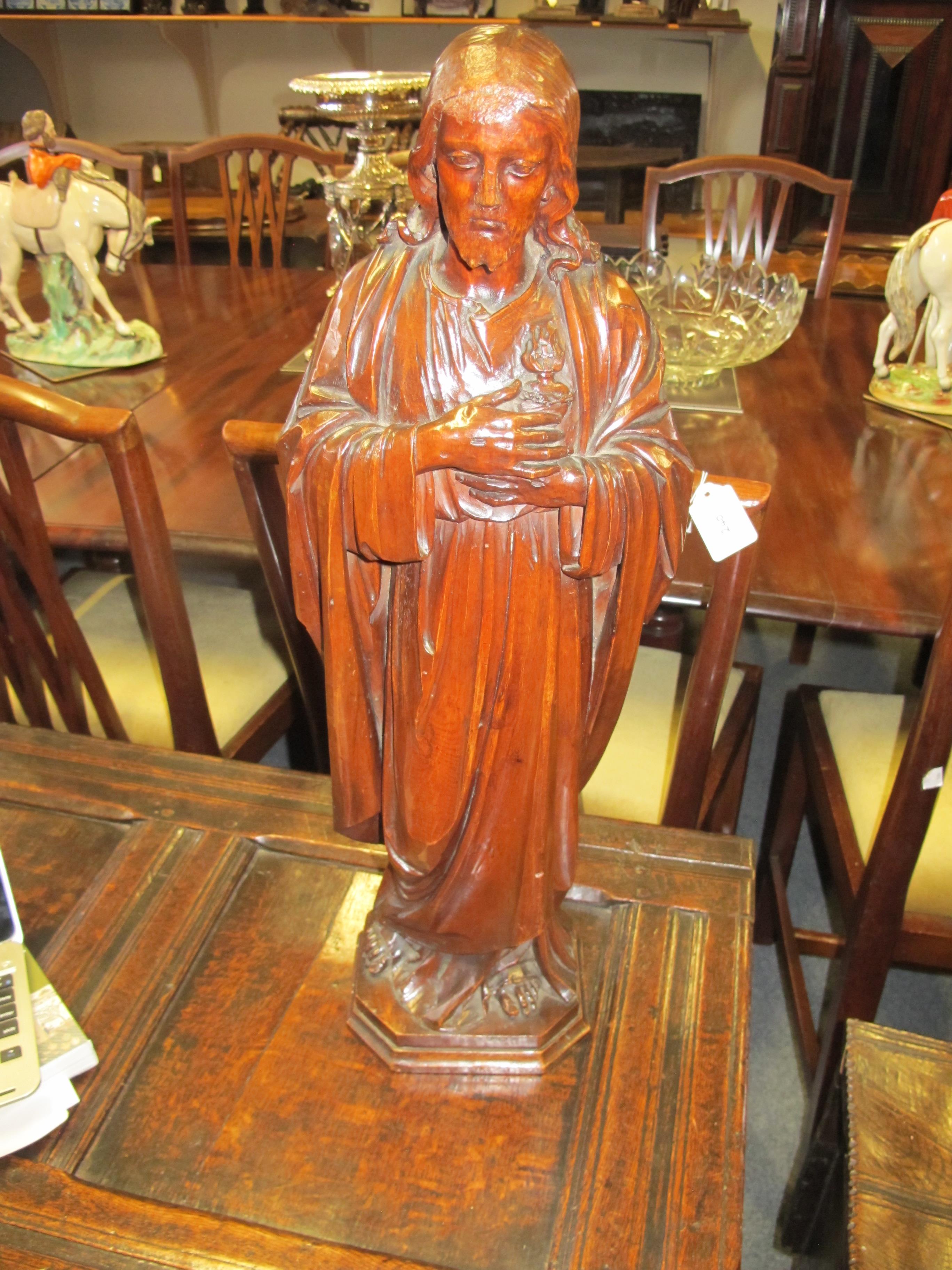 A CARVED LIMEWOOD FIGURE OF JESUS CHRIST POSSIBLY GERMAN, 18TH CENTURY depicted robed with his - Image 2 of 15