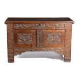 A CHARLES II OAK COFFER PROBABLY WELSH, C.1660 the hinged lid revealing an interior with twin lidded