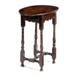 A QUEEN ANNE OAK OCCASIONAL TABLE EARLY 18TH CENTURY the oval top above an end frieze drawer, on