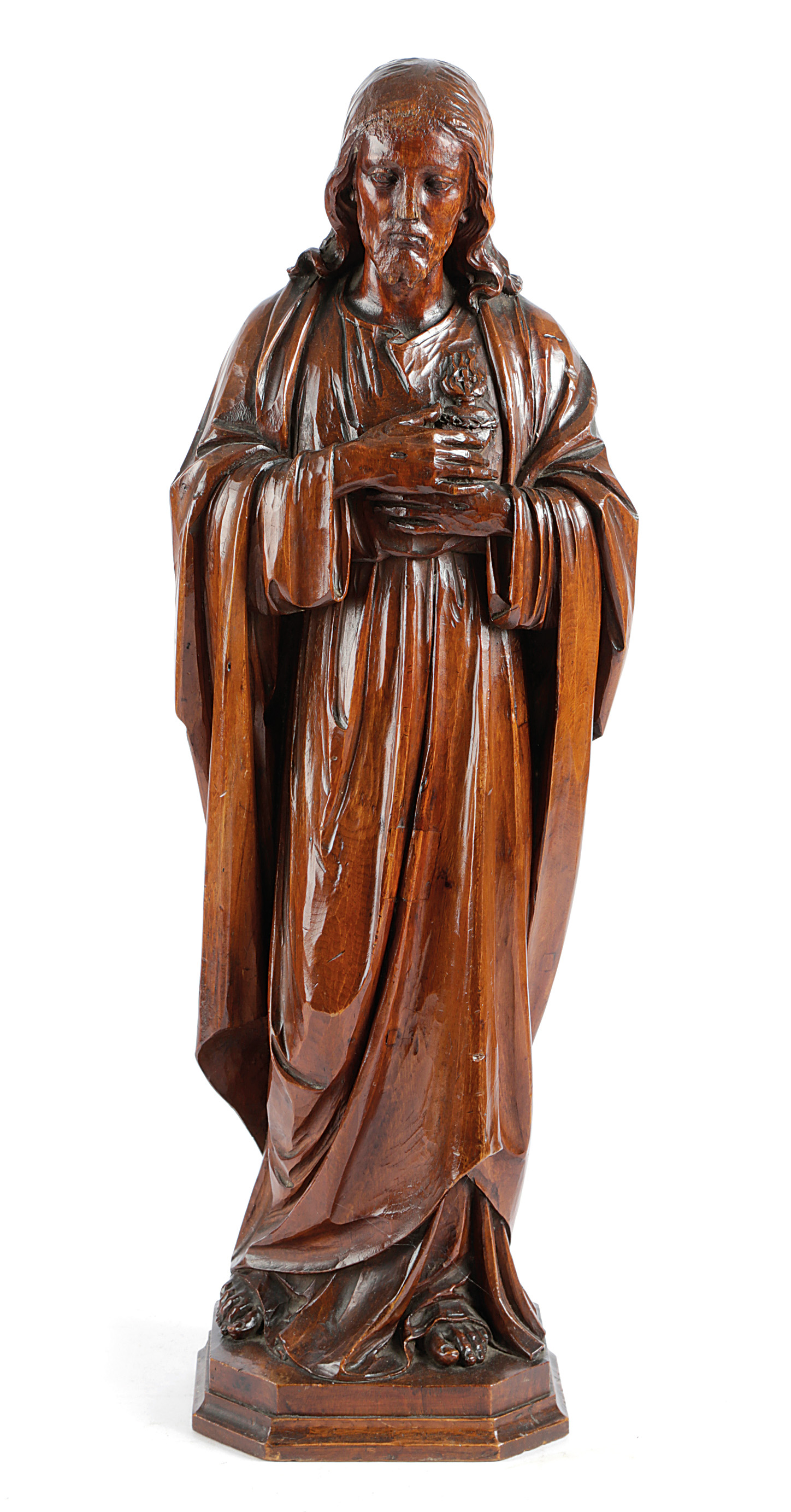 A CARVED LIMEWOOD FIGURE OF JESUS CHRIST POSSIBLY GERMAN, 18TH CENTURY depicted robed with his