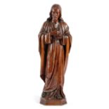 A CARVED LIMEWOOD FIGURE OF JESUS CHRIST POSSIBLY GERMAN, 18TH CENTURY depicted robed with his