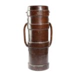 A LEATHER ARTILLERY SHELL STICKSTAND with a pair of lug handles and a metal liner 74.5cm high