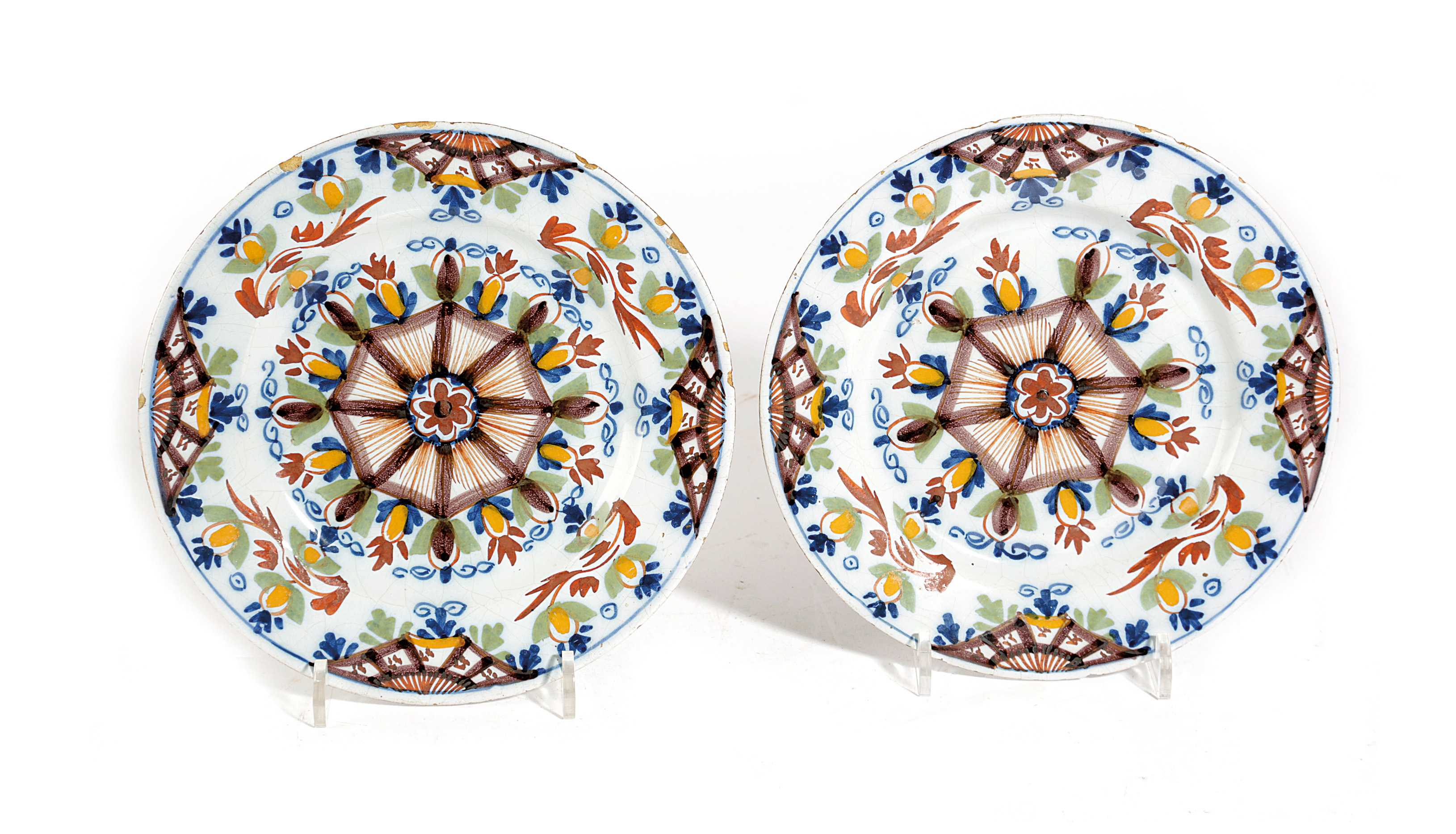 A PAIR OF DELFTWARE POTTERY PLATES PROBABLY LAMBETH, LATE 18TH CENTURY each polychrome decorated