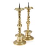 A PAIR OF FLEMISH BRASS PRICKET CANDLESTICKS LATE 17TH / EARLY 18TH CENTURY each with a dished