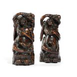 A PAIR OF WALNUT CORBEL WALL BRACKETS FRENCH, 17TH CENTURY carved with a semi-naked maiden, possibly