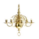 A SMALL DUTCH BRASS SIX-LIGHT CHANDELIER 18TH CENTURY with a turned stem and detachable scroll