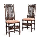 A PAIR OF CHARLES II WALNUT 'BOYES AND CROWNE' SIDE CHAIRS C.1680 carved with scrolling leaves and