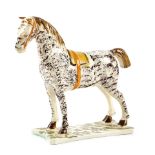 A PRATT WARE TYPE POTTERY MODEL OF A HORSE POSSIBLY NEWCASTLE OR LEEDS, C.1800-1810 standing four