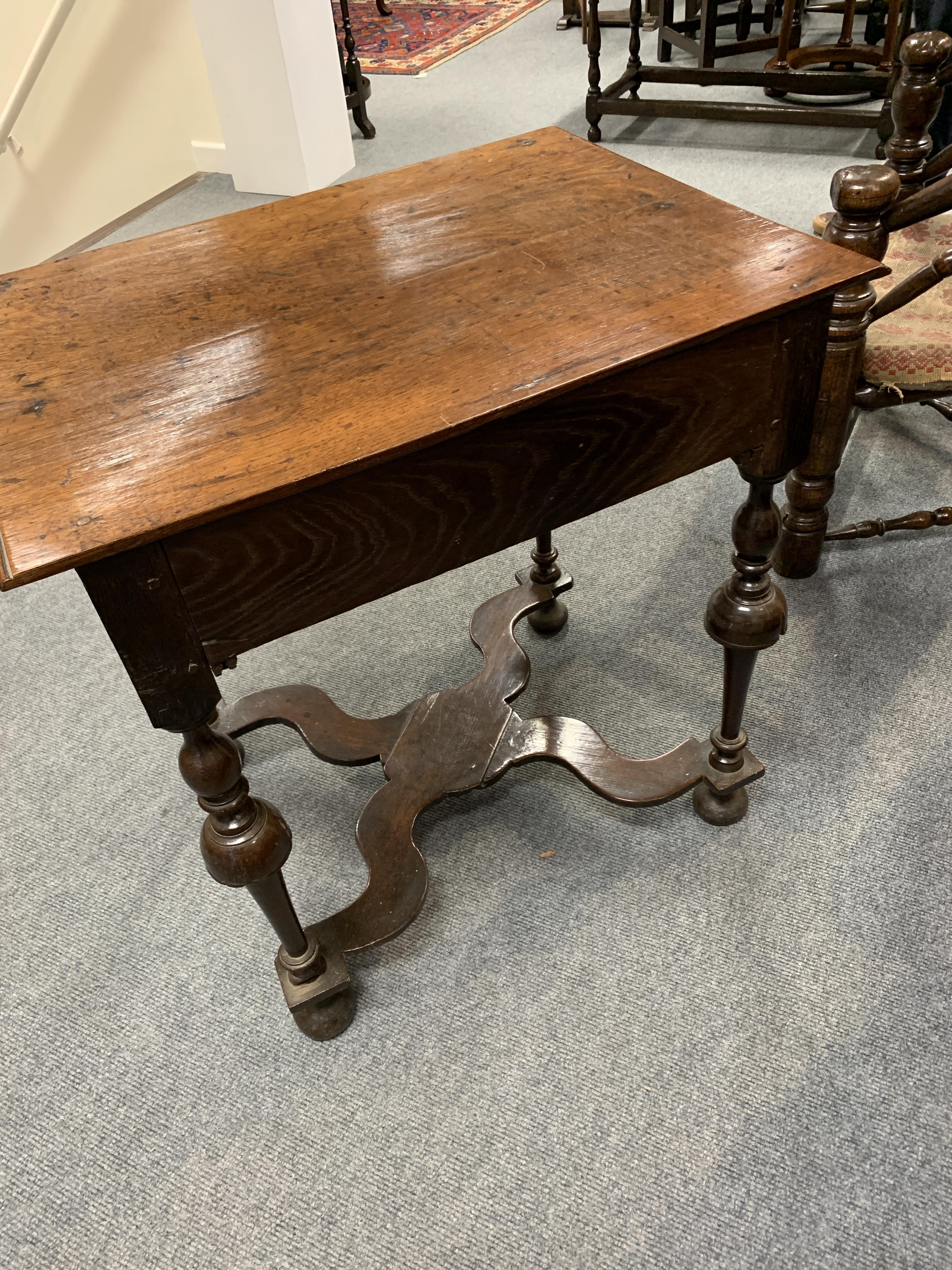 A WILLIAM AND MARY OAK SIDE TABLE C.1690 the rectangular top with a moulded edge, above a frieze - Image 5 of 14