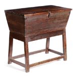 A STAINED PINE DOUGH BIN ON STAND 19TH CENTURY the hinged top revealing a later divided interior