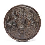 A TREEN CONFECTIONERY MOULD MID-19TH CENTURY intaglio relief carved with the Royal Coat of Arms, the