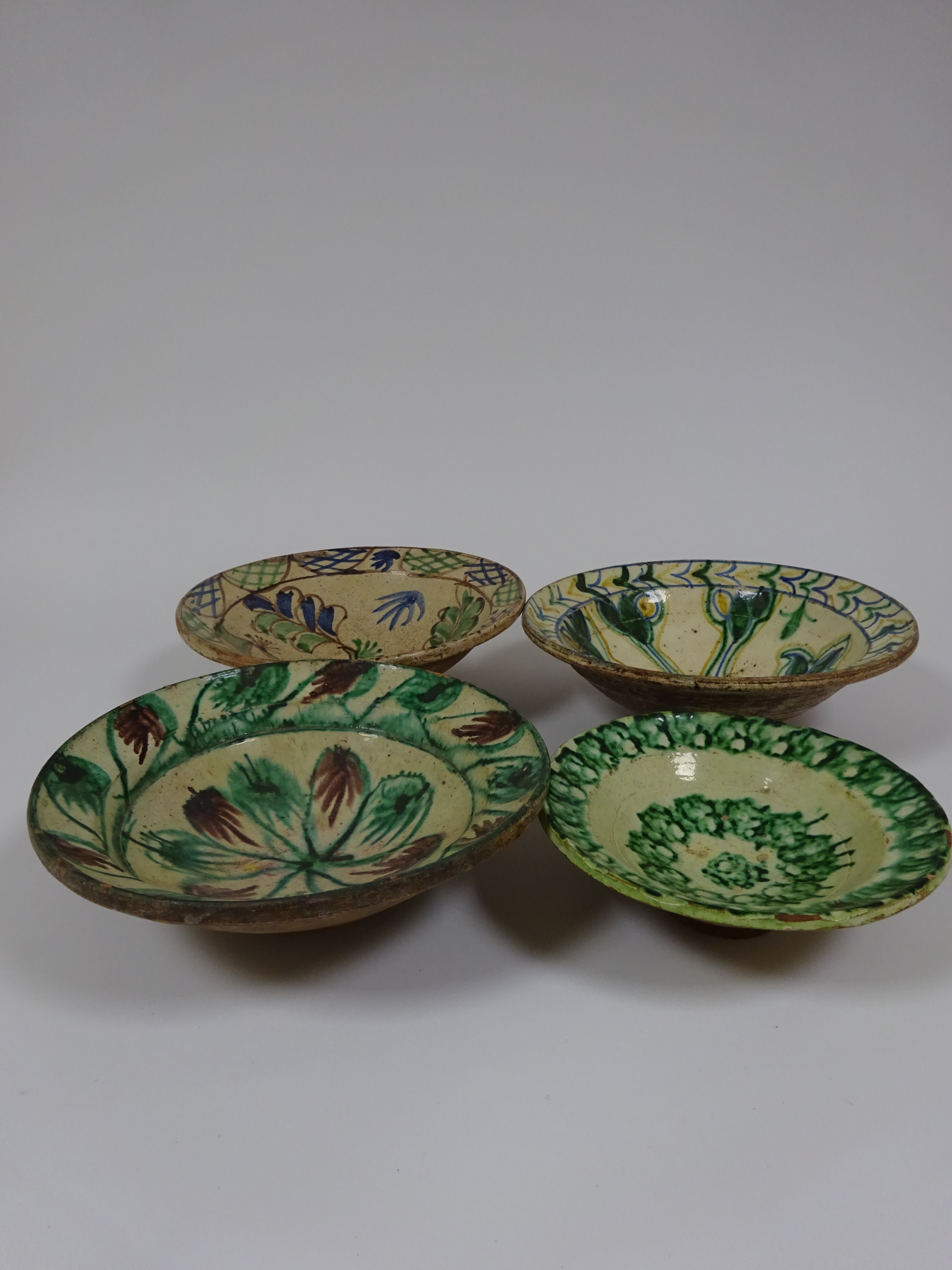 THREE SPANISH TIN-GLAZED POTTERY BOWLS 19TH / 20TH CENTURY each painted with flowers and a smaller - Image 2 of 13